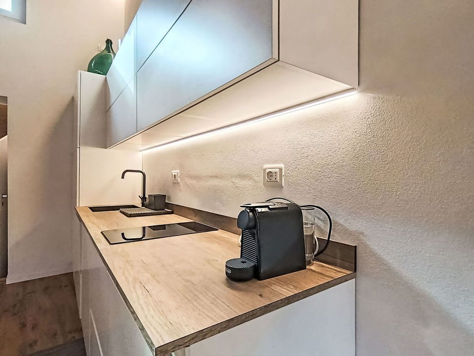 Interior Design, Wood, Kitchen, Countertop, Flooring, Lighting, Kitchen Appliance, Home Appliance, Ceiling, Floor