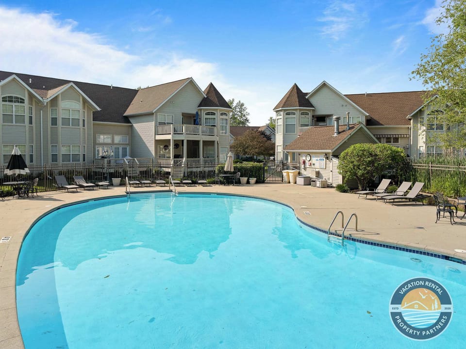 Community pool access: Cool off on warm summer days with access to a sparkling shared pool. Seasonal access from May through September with plenty of lounge chairs and sunny poolside relaxation.