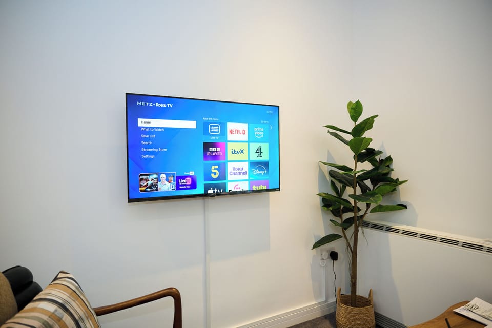 Cosy TV area with streaming services for movie night, or if you enjoy sports, there are options available.