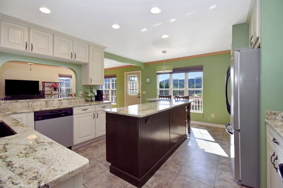 Enjoy the mountain view and/or the TV while at the stove or sink.