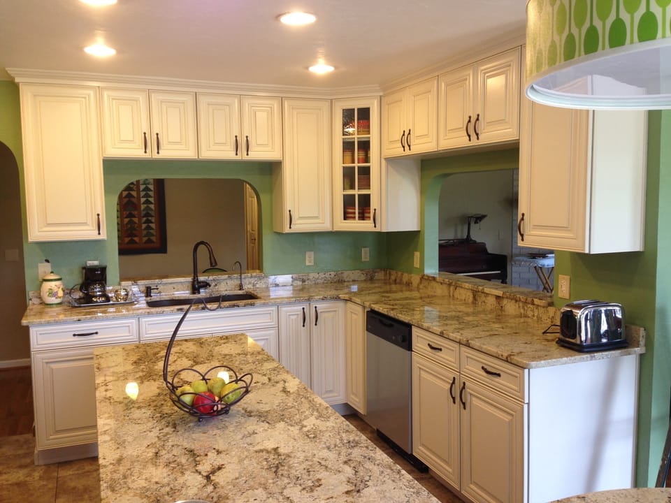 The kitchen is the heart of this home. Deluxe granite countertops.