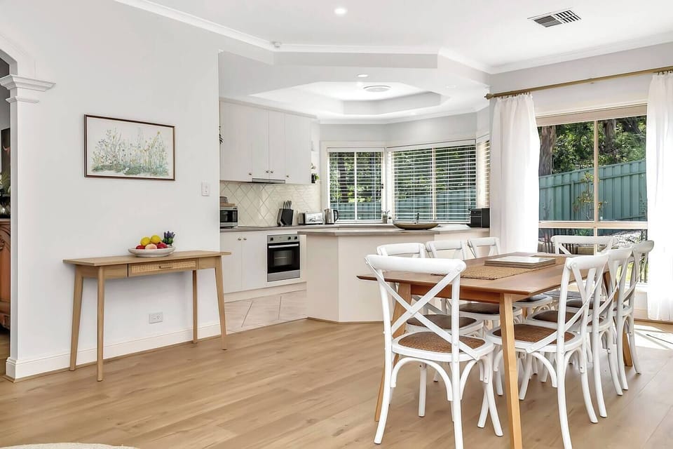 A spacious open plan kitchen and dining area encourages togetherness over shared meals and conversation.