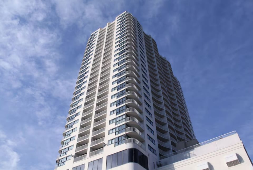 Stay in style at The Flagship — a modern high-rise overlooking the ocean!