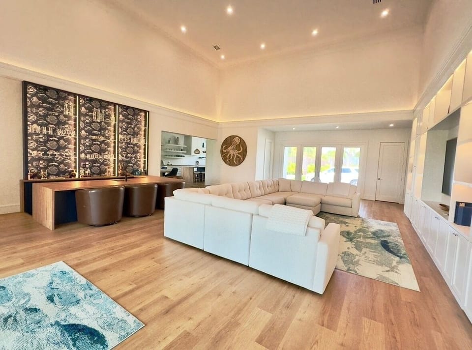 Living Room with Sunken Bar Area