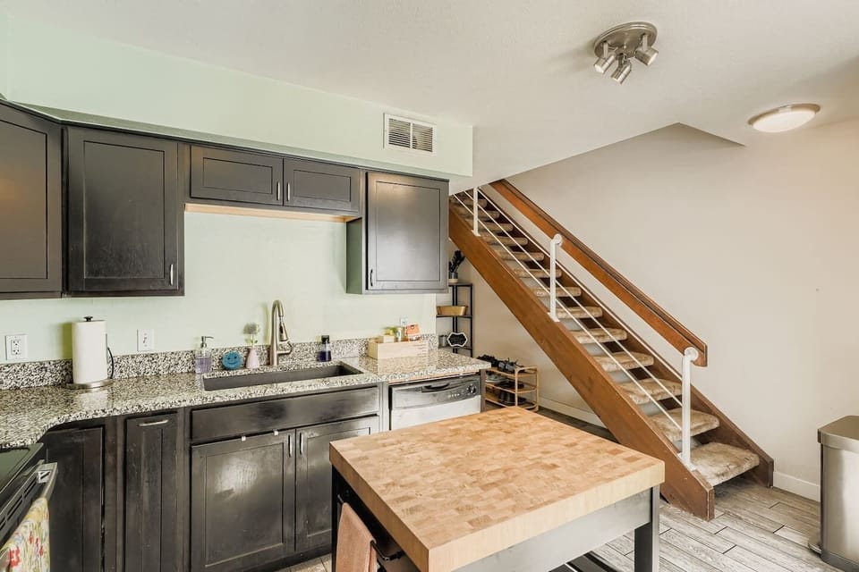 Fully equipped kitchen with walkout patio