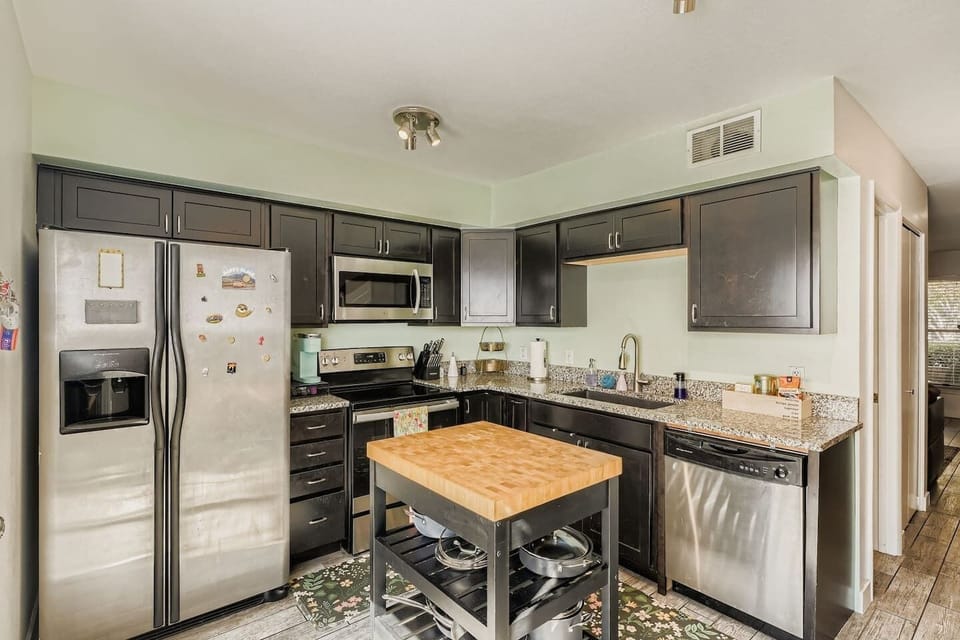 Fully equipped kitchen with walkout patio