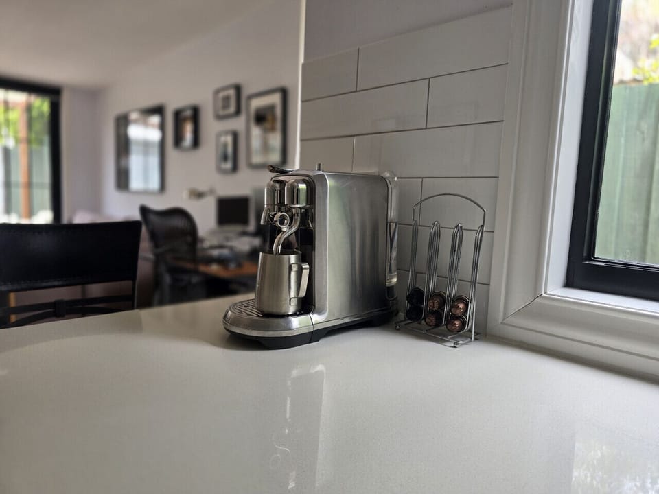 Enjoy barista style coffee at the push of a button from the Nespresso