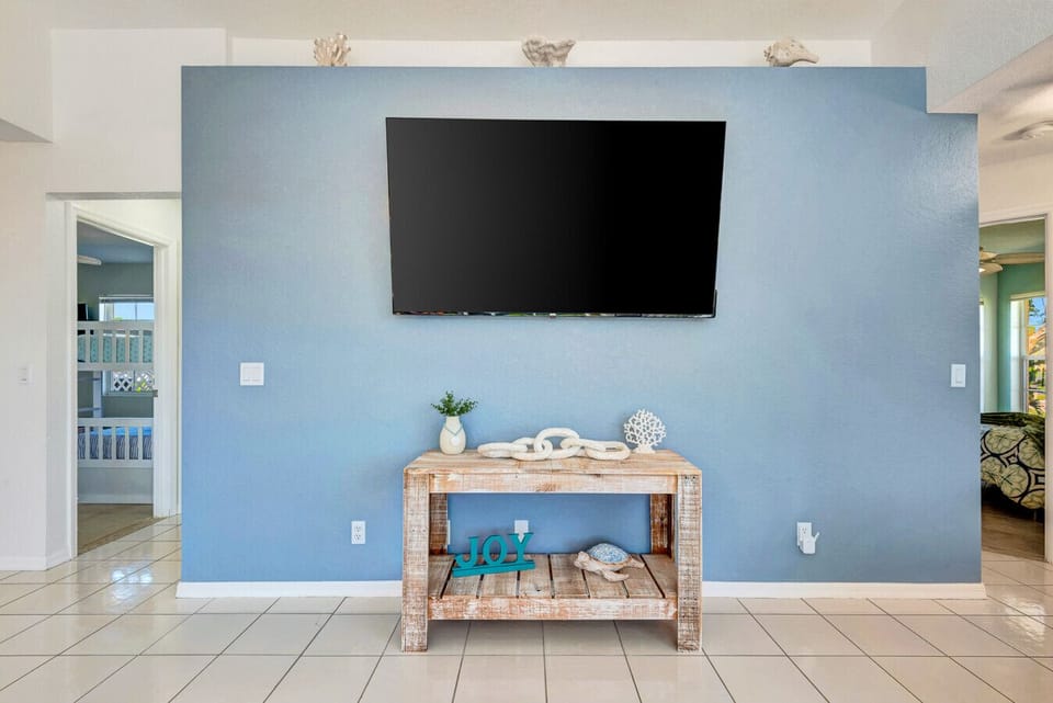 Open Concept Living | Spacious Layout with Pool Access and Breakfast Bar Seating