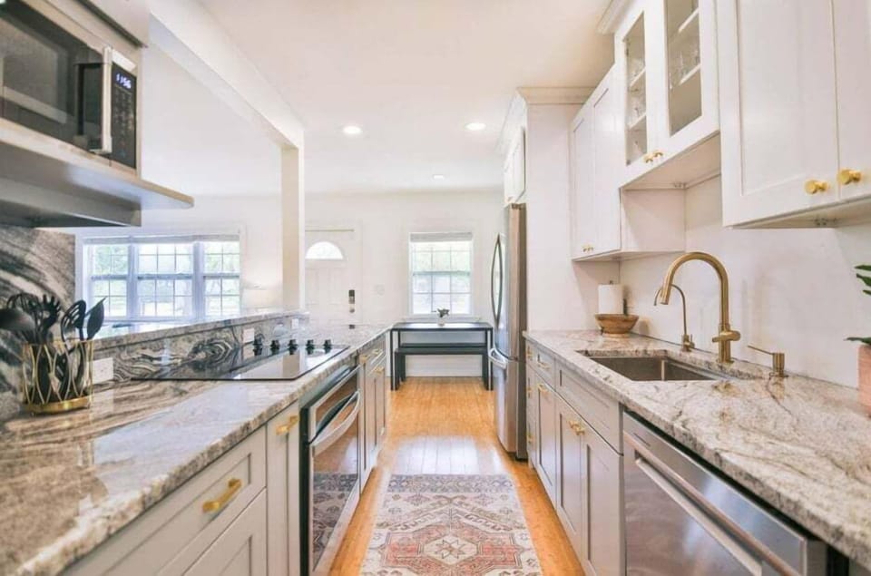 Beautiful, clean appliances and spacious countertops for cooking.