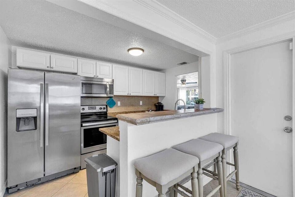 The full-size kitchen comes stocked with basic cookware and utensils so you can enjoy home cooked meals even on vacation.
