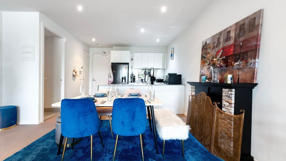 Bright, open dining area connecting seamlessly to the kitchen and lounge.