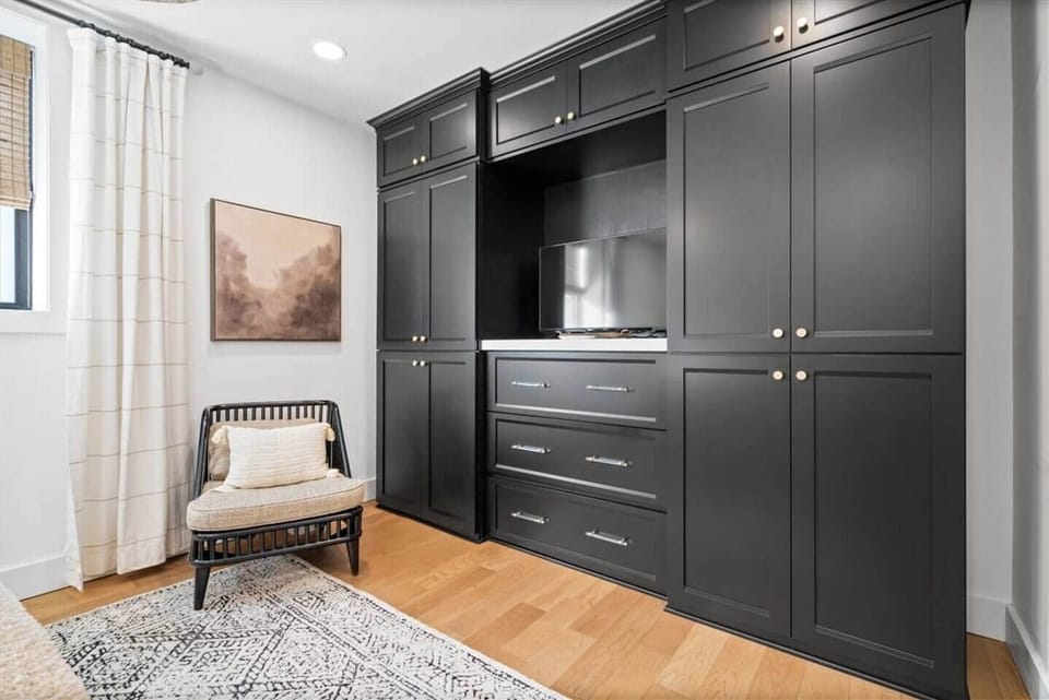 Stay connected and comfortable — TV for your favorite shows and wireless charging for all your devices.