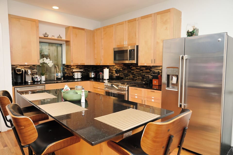 A beautiful kitchen with everything you need to make an at-home meal.