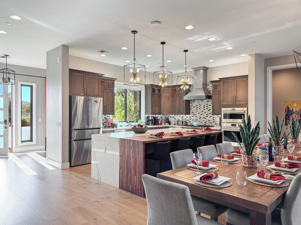 The entrance opens up to the kitchen and dining area.