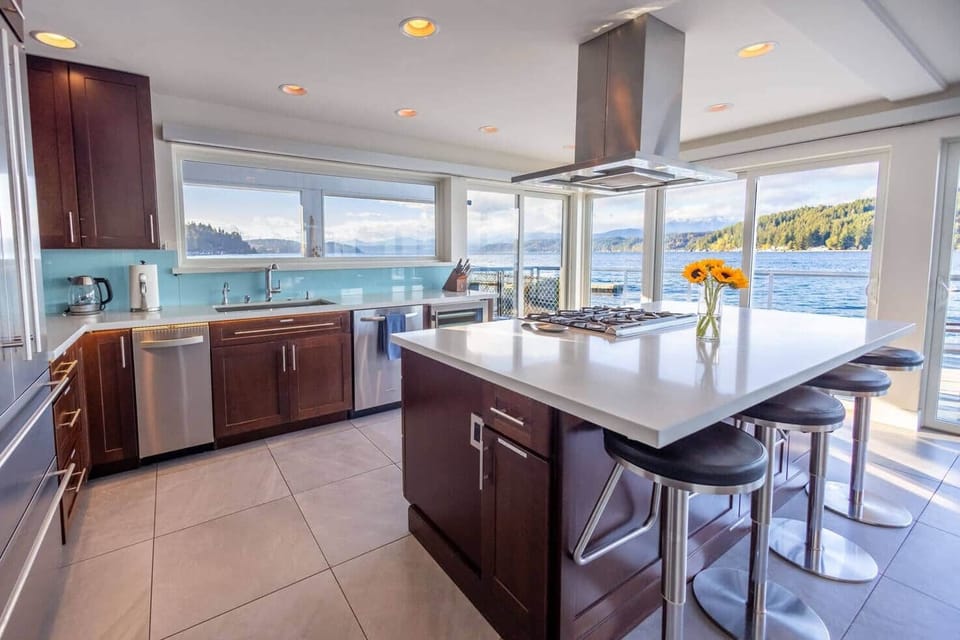 Walls of Glass fully outfitted kitchen with GE gas range and oven