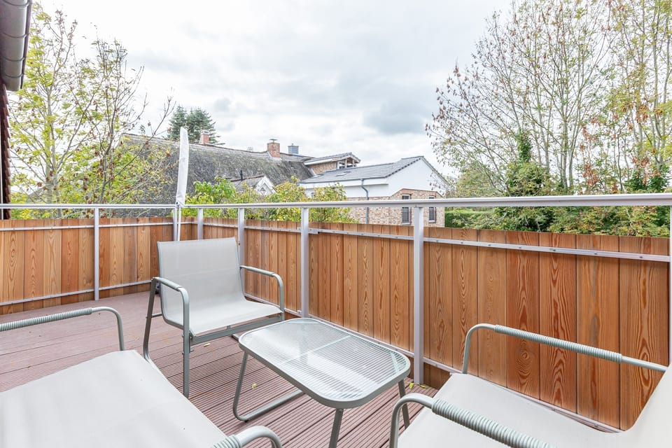 Modern Terrace with Table and Chairs