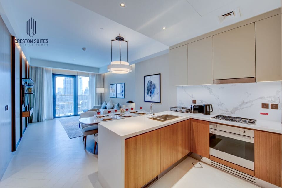 The kitchen and dining area layout and furnishings may vary slightly between rooms, yet each offers a stylish, comfortable, and well-appointed setting for your stay