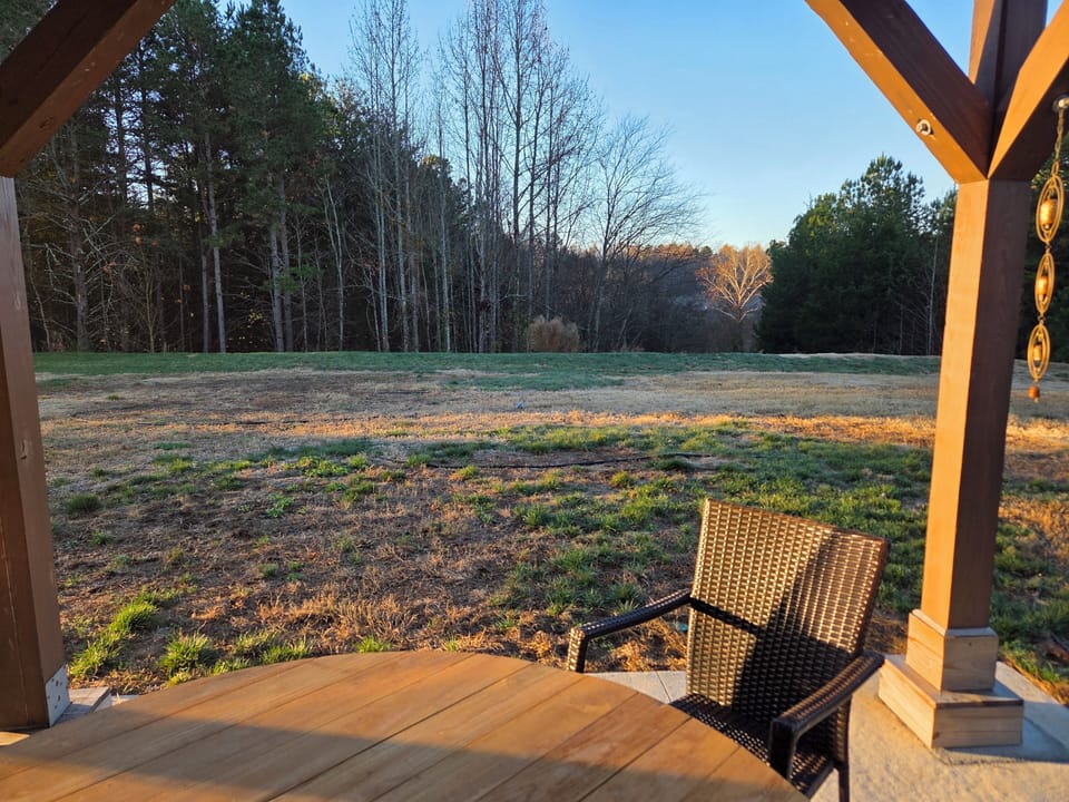 Enjoy the private backyard from the large covered patio.