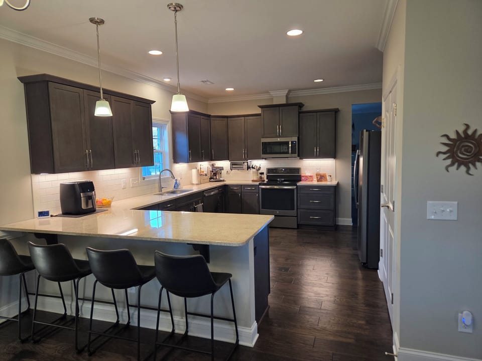 Fully-stocked kitchen with plenty of counter space.