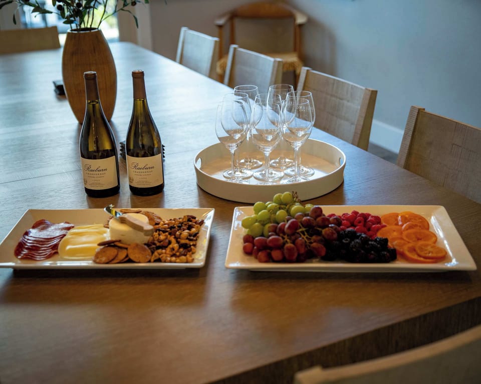 Inviting setup with wine, glasses, and fresh snacks—perfect for relaxed evenings, celebrations, or sharing a cozy moment together. A warm, welcoming touch that makes gatherings feel extra special.
