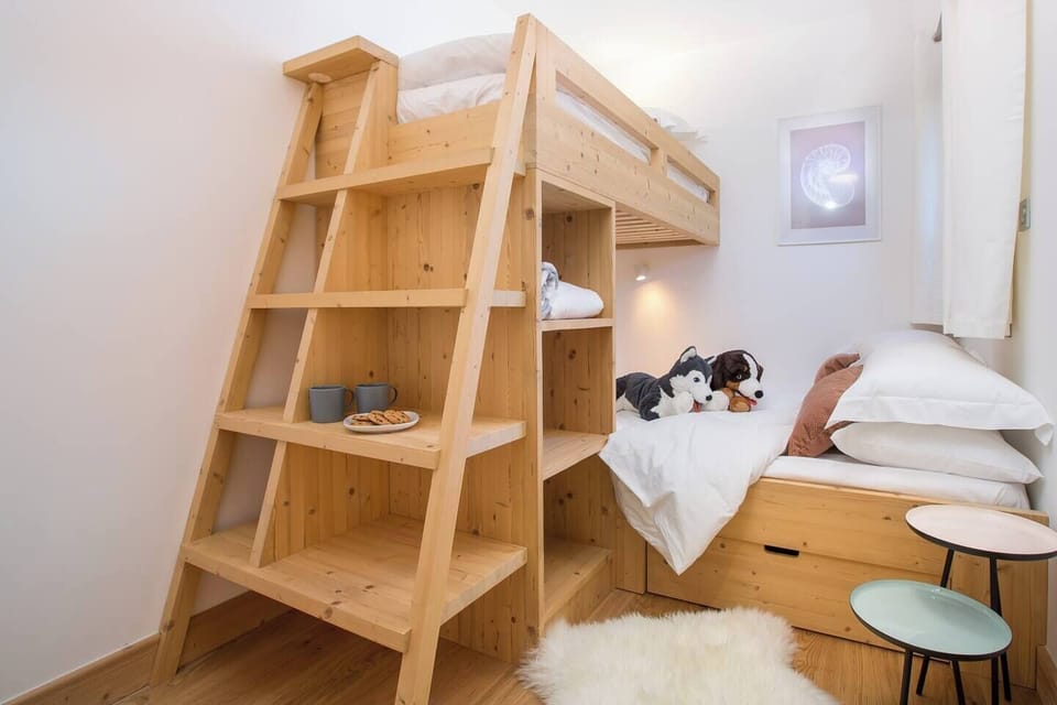 Bunk room with double lower bunk