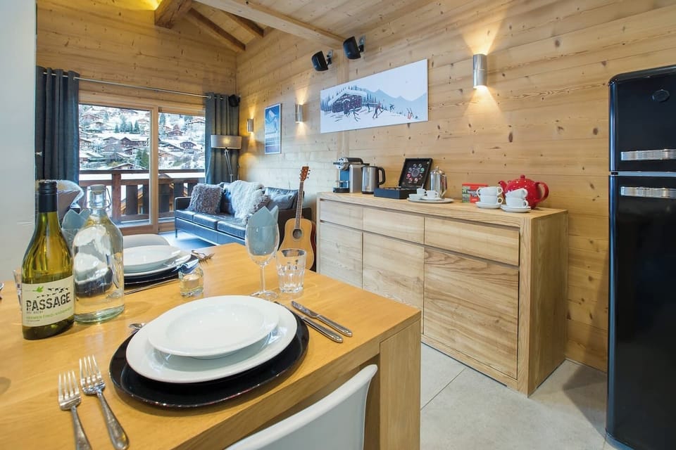 Large Open Plan kitchen with breakfast bar and seperate dining space with Buffet and Nespresso Machine and Additional Wine Fridge