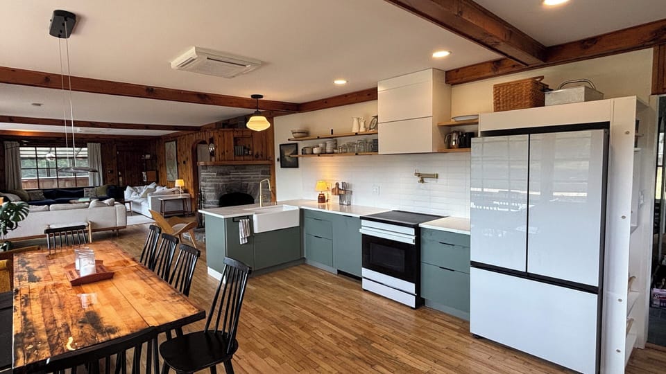 1 of 2 newly renovated kitchens. This kitchen overlooks the lake and fireplace.