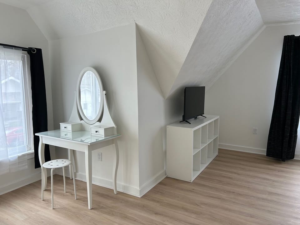 Vanity, shelving and tv...such a fun room!