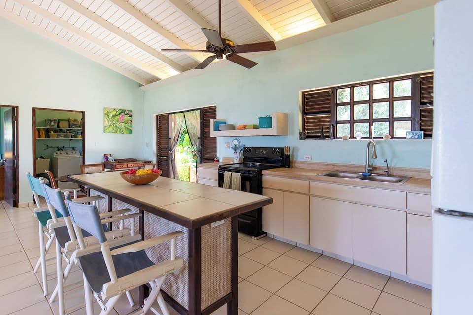 Kitchen space featuring a cozy bar seating area