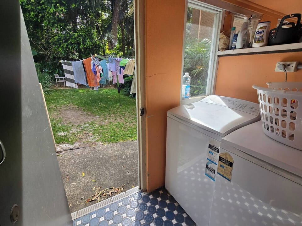 Your private washing machine is located just outside the apartment. Drying racks are provided, and a shared clothesline is available in the garden.