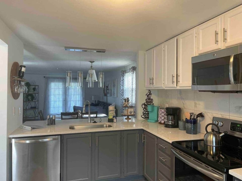 Big kitchen w/ new appliances—open to dining / living for seamless gatherings.