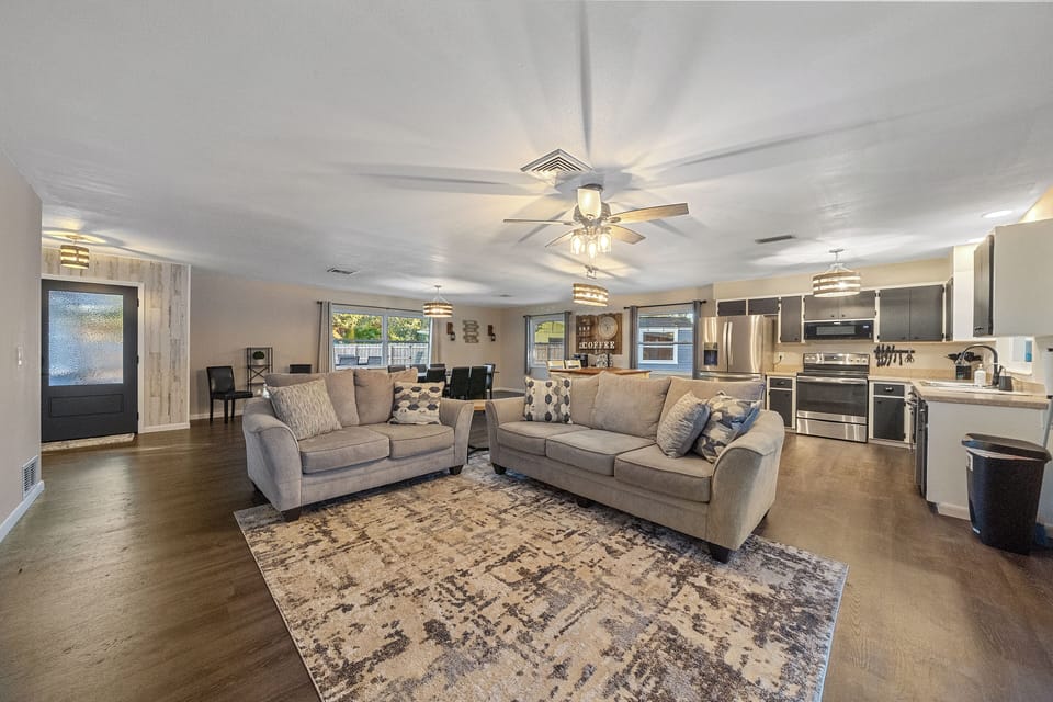 Comfy living area with cozy sofas.