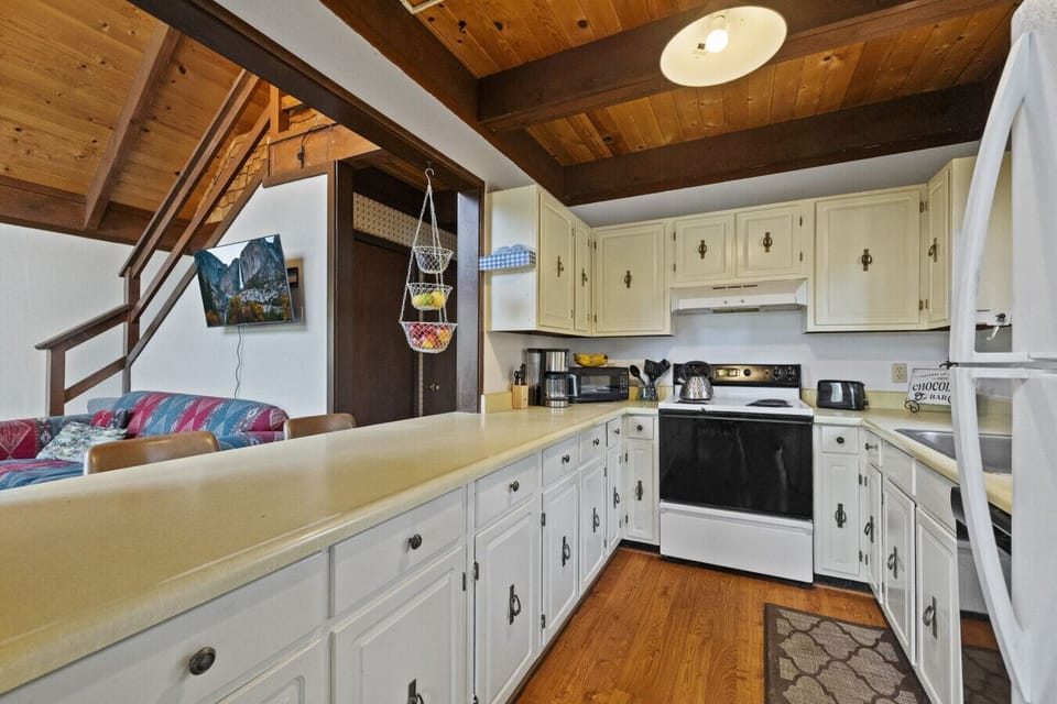 The heart of the cabin -warm, simple, and fully stocked