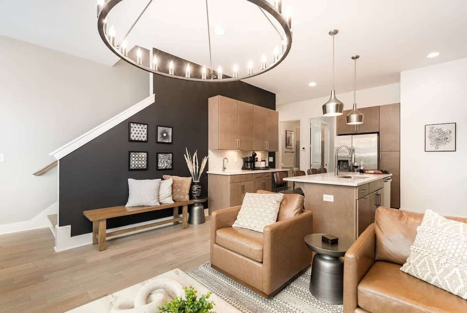 2nd Floor: Open concept living area with cozy seating and modern design that flows effortlessly into the open kitchen.