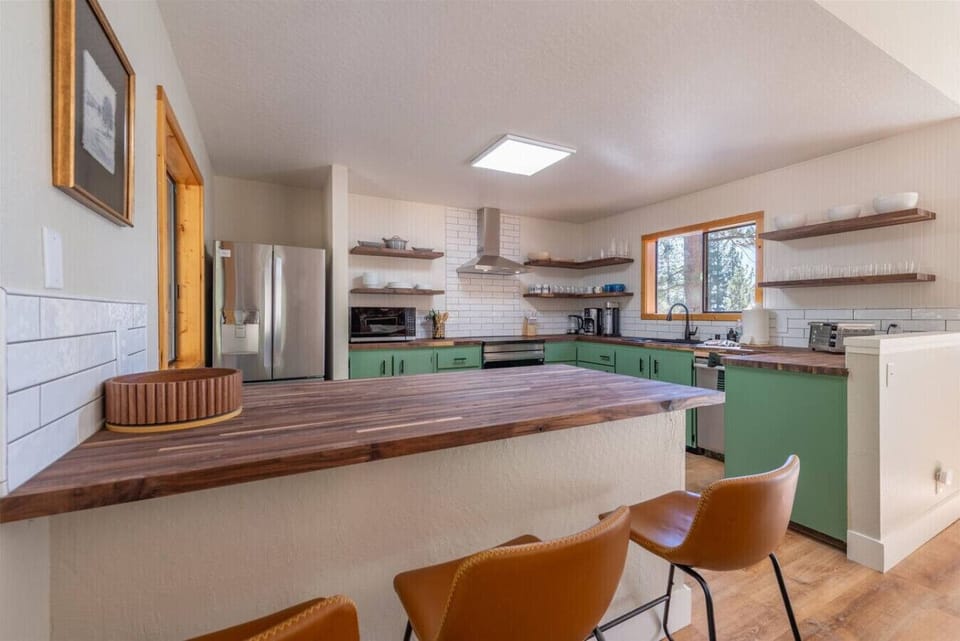 Nicely appointed kitchen with new stainless appliances.