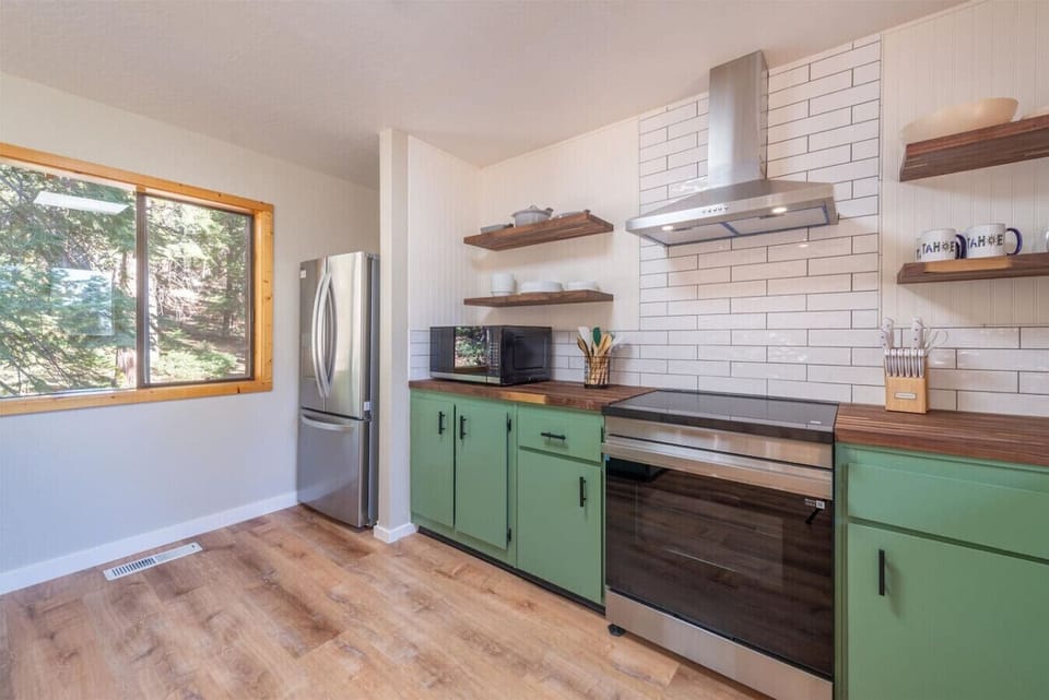 Nicely appointed kitchen with new stainless appliances.