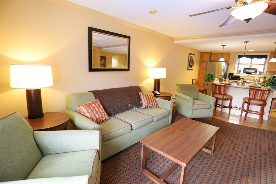 Open living, kitchen, and dining area at resort condominium