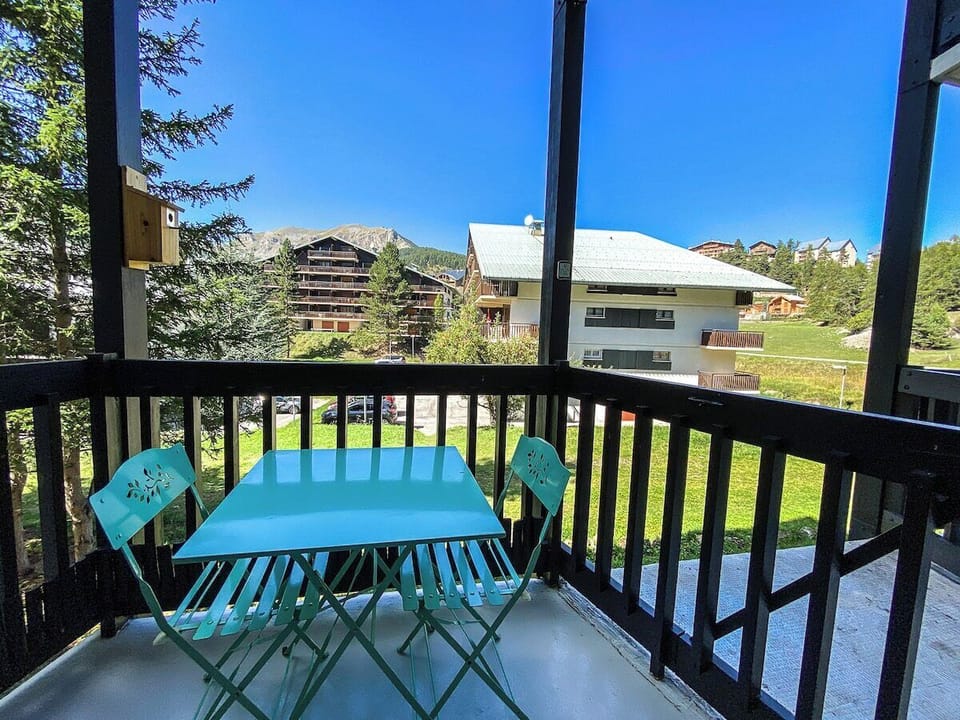 Spacious balcony with mountain views