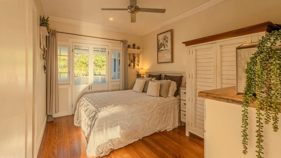 Peaceful bedroom with plenty of natural light.