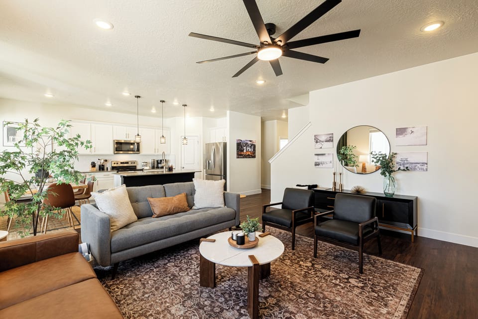 Living area facing kitchen and dining