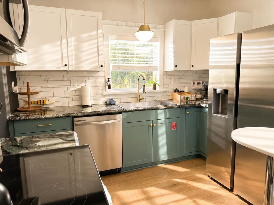 Spacious kitchen layout with generous counter space & thoughtful extras.