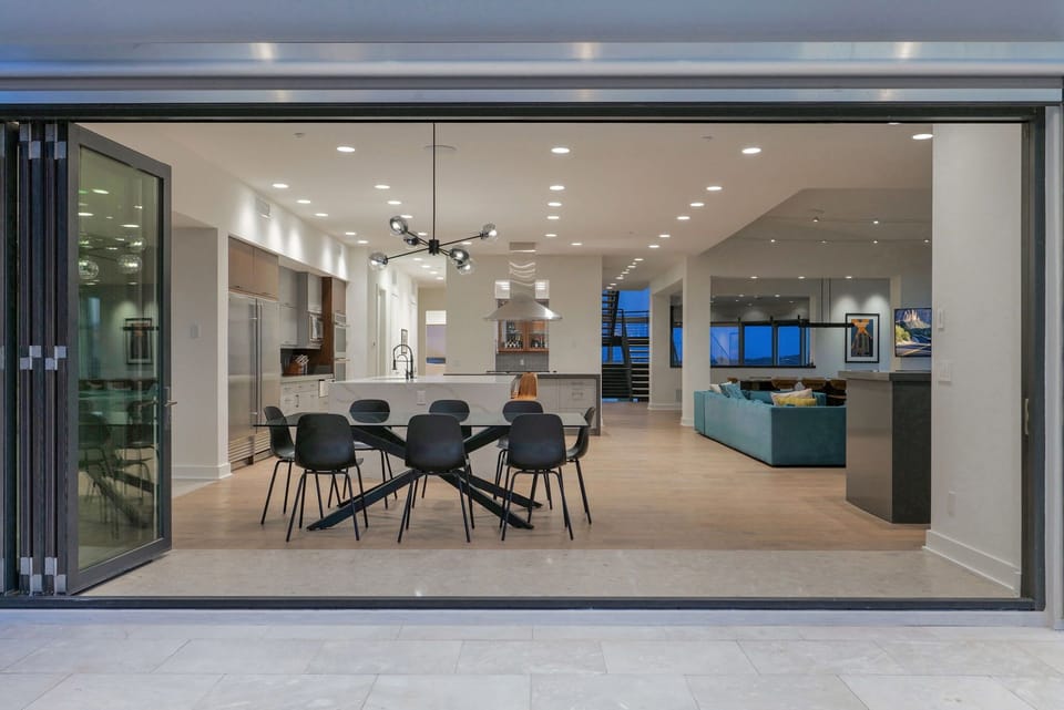 Gather and connect in this expansive, luminous living space.