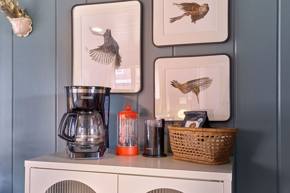 Enjoy our Coffee Bar, complete with a coffee maker, French press, grinder, and complimentary morning coffee!
