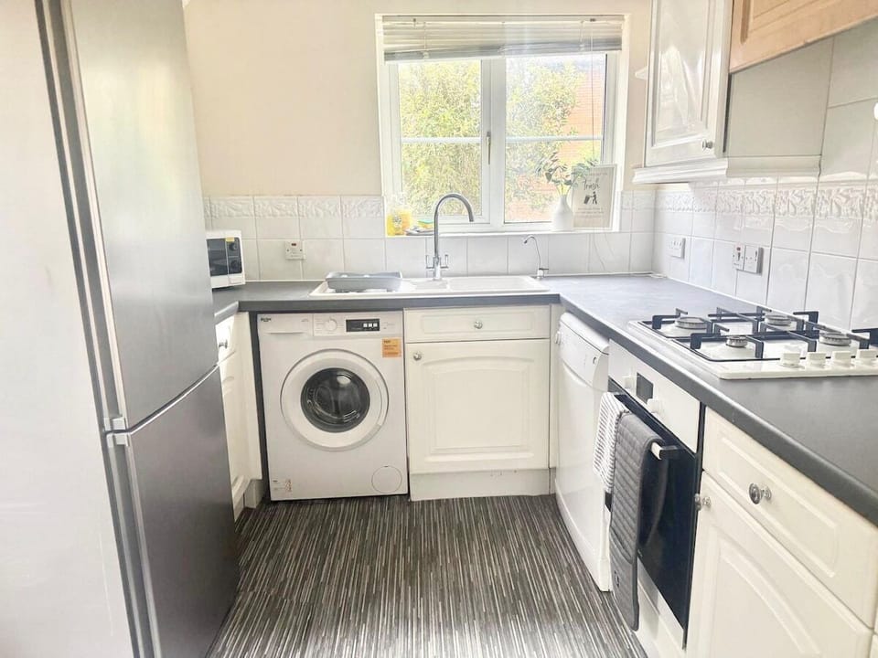 Kitchen with washing machine 