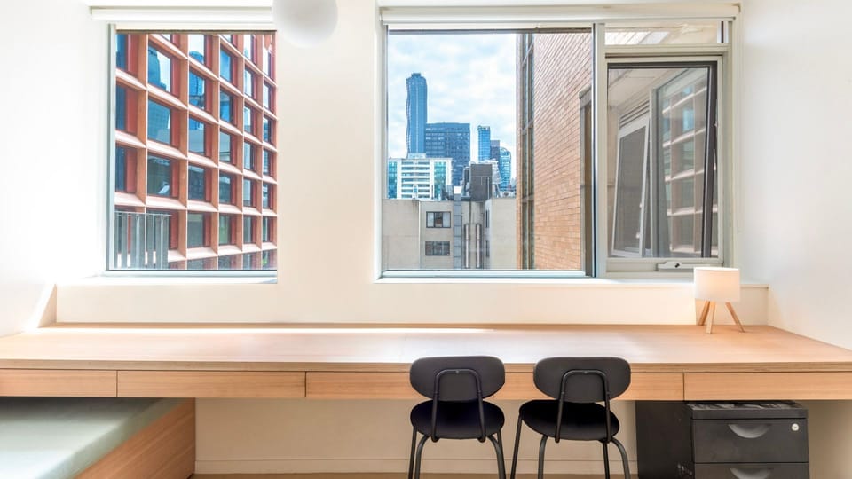 Work desk with a city outlook — ideal for remote work or study.
