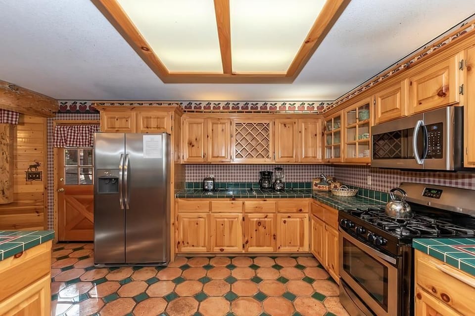 Kitchen With Backyard Deck Access