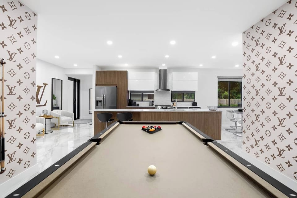 Featuring a full-size pool table for entertainment.