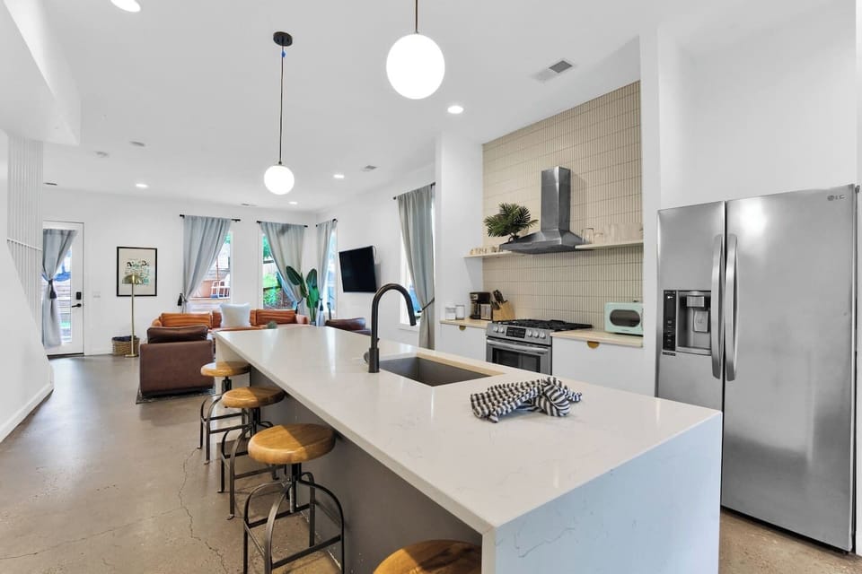 Entertain the cook at the bar or have extra seating for eating