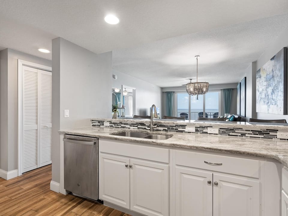 Bright, open kitchen with granite countertops and modern finishes