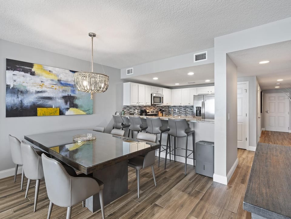 Bright, open dining and kitchen area with modern finishes